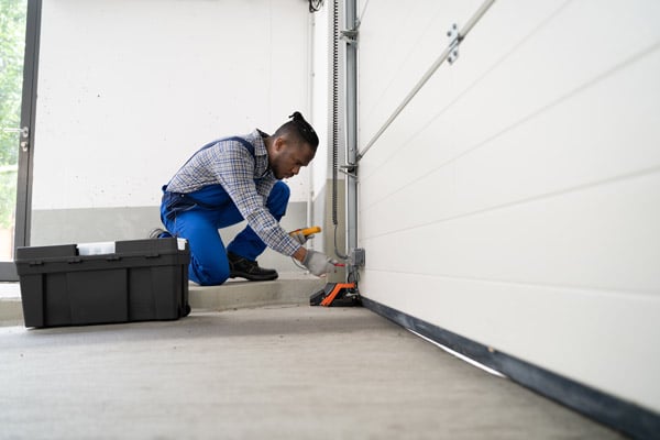When to Repair or Replace Your Commercial Sectional Door